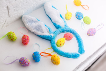 Colorful Easter eggs with hand drawn bunny ears. Funny Easter concept