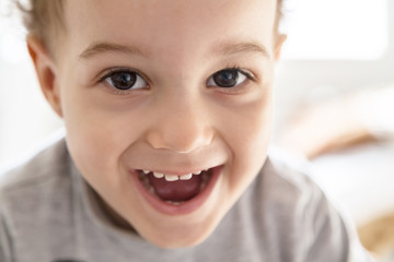 Portrait of lovely boy smiling in a sunny day