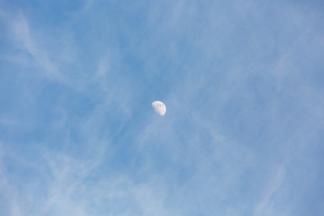 Blue sky with small dense white clouds