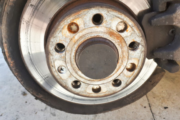 Closeup disc brake of the vehicle for repair. Detail image of car brakes.