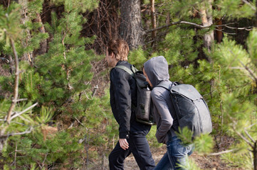 Hiker couple hiking in forest