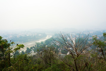 Obraz na płótnie Canvas LUANG PRABANG LAOS APRIL 14.2019 : view from Mount Phou Si, Phu Si, High hill in the centre of the old town of Luang Prabang in Laos