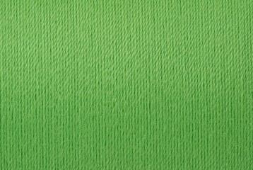 Macro picture of green thread texture background