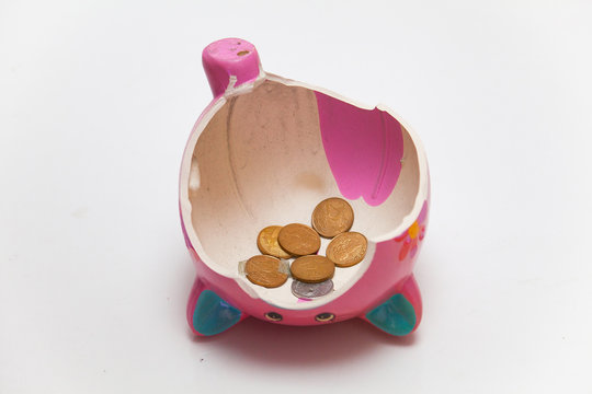 Broked pink piggy bank
