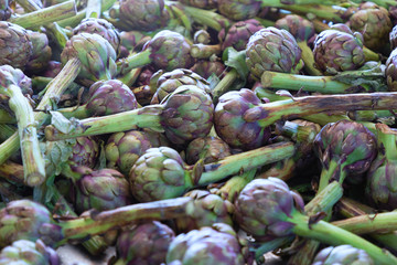 Fototapeta na wymiar Raw artichokes on the local market