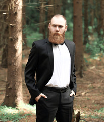 close up.portrait of a successful businessman on a blurred background