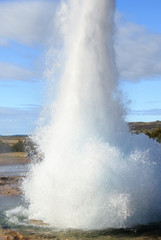 Fototapeta na wymiar Strokkur Geyser eruption. Eruption of hot water. Gold Circle. Iceland.