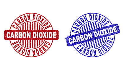 Grunge CARBON DIOXIDE round stamp seals isolated on a white background. Round seals with grunge texture in red and blue colors.