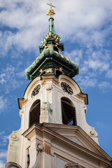 Broach of a chapel against blue sky