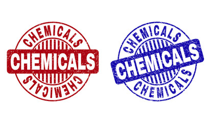 Grunge CHEMICALS round stamp seals isolated on a white background. Round seals with grunge texture in red and blue colors. Vector rubber watermark of CHEMICALS tag inside circle form with stripes.