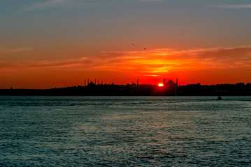 Fototapeta premium Istanbul, Turkey, 06 July 2006: Sunset at Kadikoy
