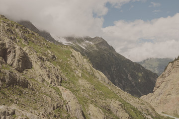 Panorama of mountains on route of Trift Bridge in national park Switzerland