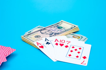 Playing Cards, Gaming Dices and Dollar Bills Stack on Background