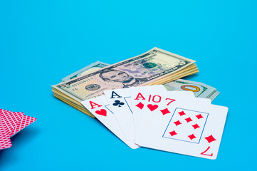 Playing Cards, Gaming Dices and Dollar Bills Stack on Background