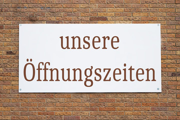 Fototapeta premium Unsere Öffnungszeiten