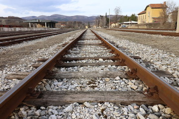 Top view on Train Tracks. Close up of train tracks. Railway close up, Train tracks, Rail-train infrastructure. Railway close up. Direction, journey.