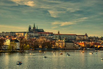 Prague castle from Vltava river with boats