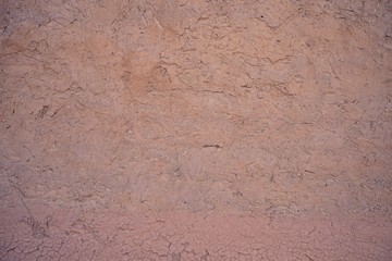 Dry cracking mud wall texture, natural background concept