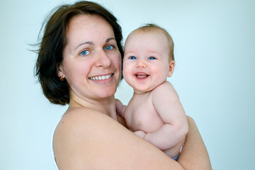 Happiness maternity concept. Mom and her baby.