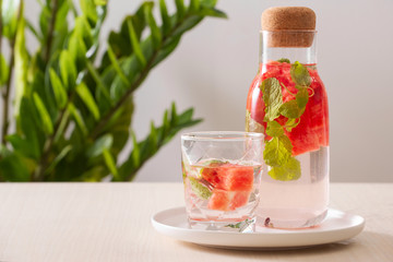 Watermelon infused water on white background