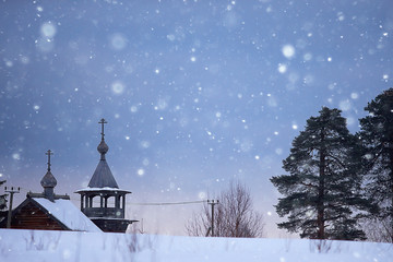 Fototapeta premium landscape in russian kizhi church winter view / winter season snowfall in landscape with church architecture