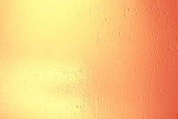 yellow tinted glass drops / abstract background texture