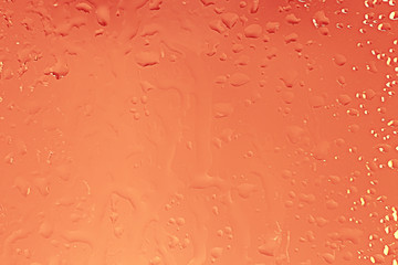 yellow tinted glass drops / abstract background texture