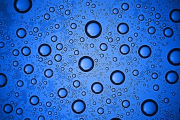 fresh drops background blue glass / wet rainy background, water drops transparent glass blue