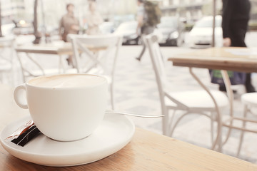English tea in a cafe / cup and kettle with five o'clock tea