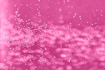 pink water bubbles background / fresh summer background pink air bubbles in water