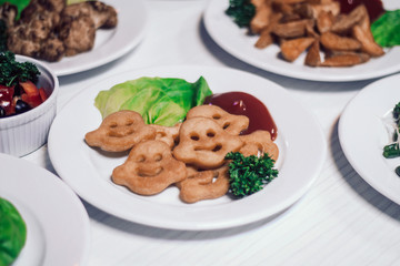 potato snacks, sauce and lettuce on the table
