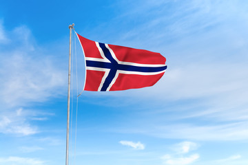 Norway flag over blue sky background