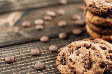 Chocolate cookies on wooden table. 
