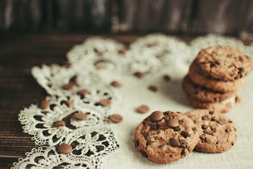 Pile of chocolate chip cookies on wooden desk,Top view