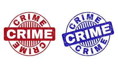 Grunge CRIME round stamp seals isolated on a white background. Round seals with grunge texture in red and blue colors. Vector rubber watermark of CRIME text inside circle form with stripes.