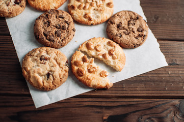 Tasty chocolate cookies on tray, closeup