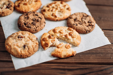 Chocolate cookies on wooden table. Chocolate chip cookies shot