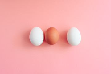 easter eggs on pink background