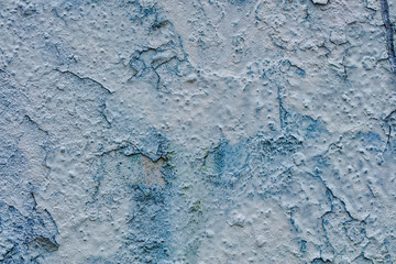 Old cracked rusty peeled colorful paint background texture close-up
