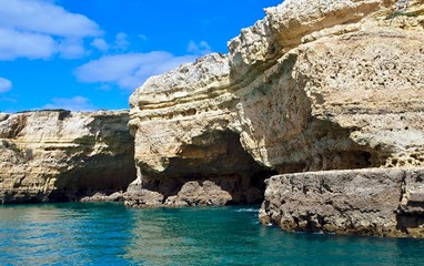 Beautiful caves in turquoise water between Albufeira and Benagil cave