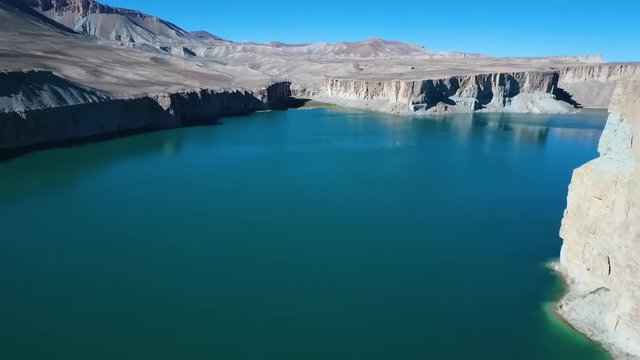 Band-e Amir Lakes. Band-e Amir National Park, Bamyan Province, Afghanistan. Aerial. Birds eye view. Flyover. Rotation. Pan Right.