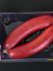 Packing of beef sausage in big and thick