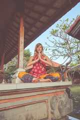 Young woman meditate- practicing yoga.