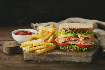 sandwich with ham and french fries