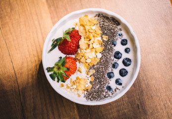 Yogurt with strawberry, blueberry, chia seed and cornflake