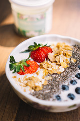 Yogurt with strawberry, blueberry, chia seed and cornflake