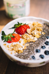 Yogurt with strawberry, blueberry, chia seed and cornflake