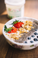 Yogurt with strawberry, blueberry, chia seed and cornflake