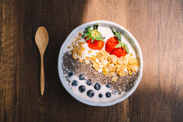 Yogurt with strawberry, blueberry, chia seed and cornflake