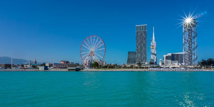 View from sea to resort town cityscape with skyscrapers. Black Sea, Adjara, Georgia. 
